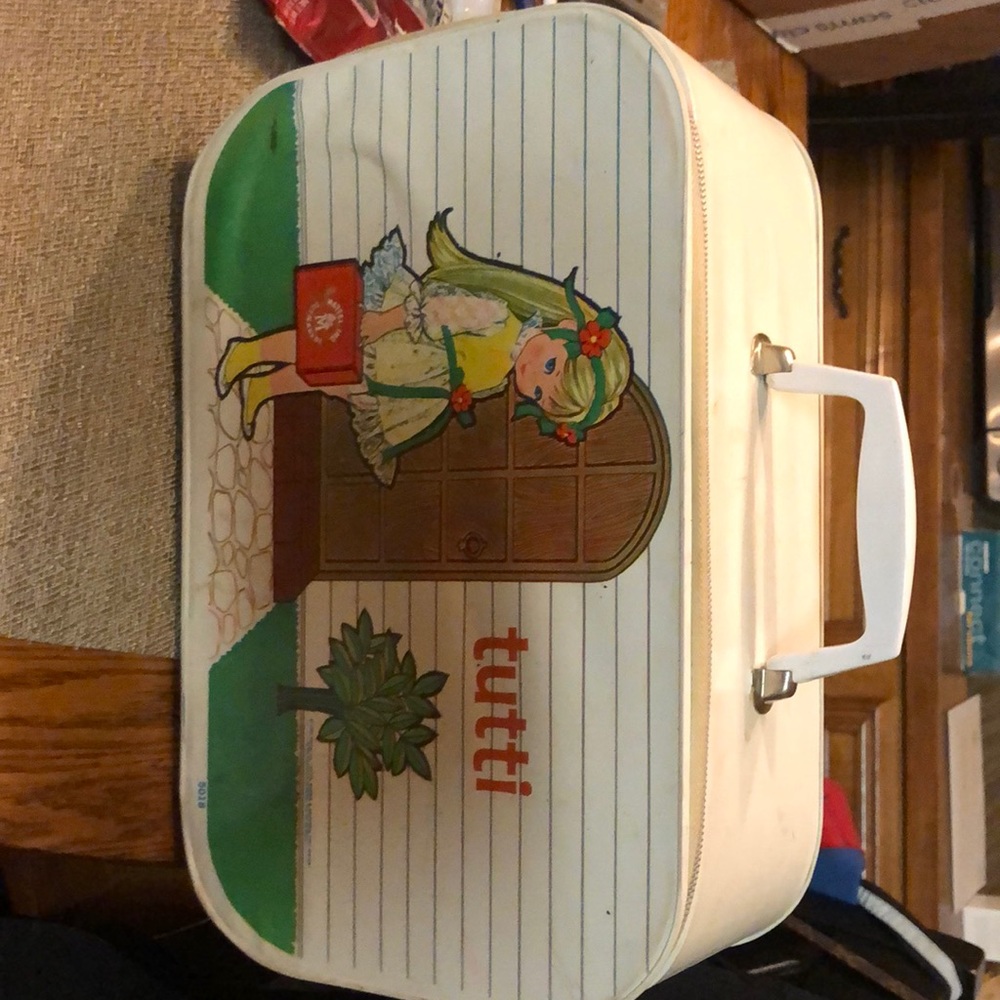 Vintage “tutti” travel bag full of old Barbie clothes